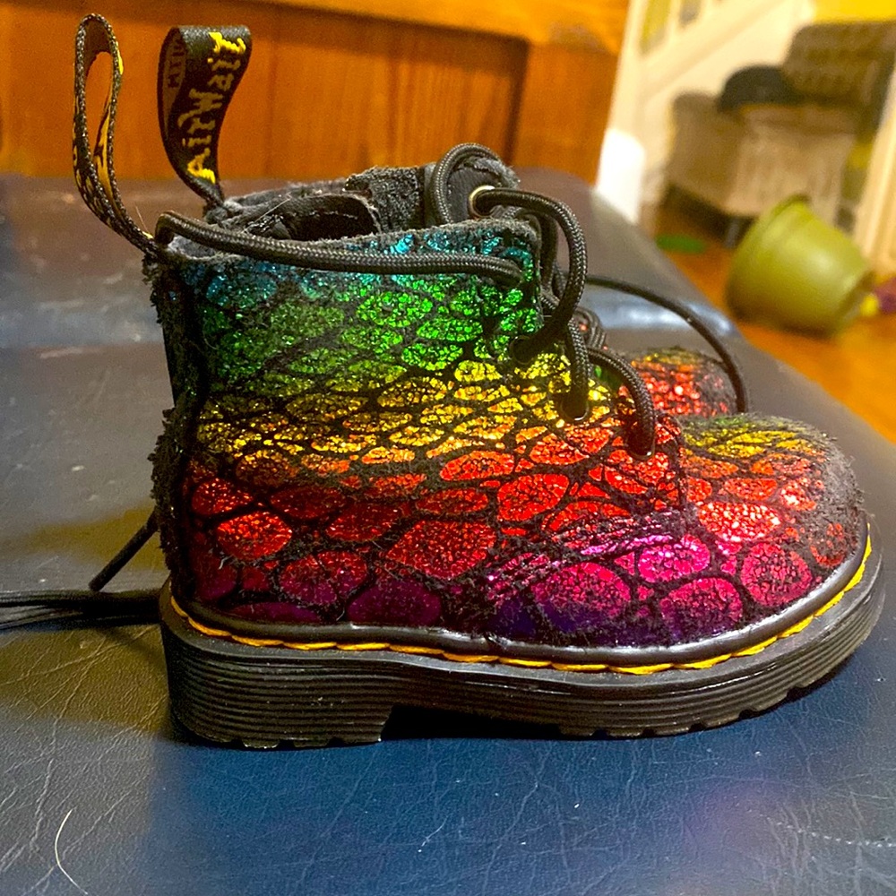 Toddler’s shiny rainbow Doc Martens.